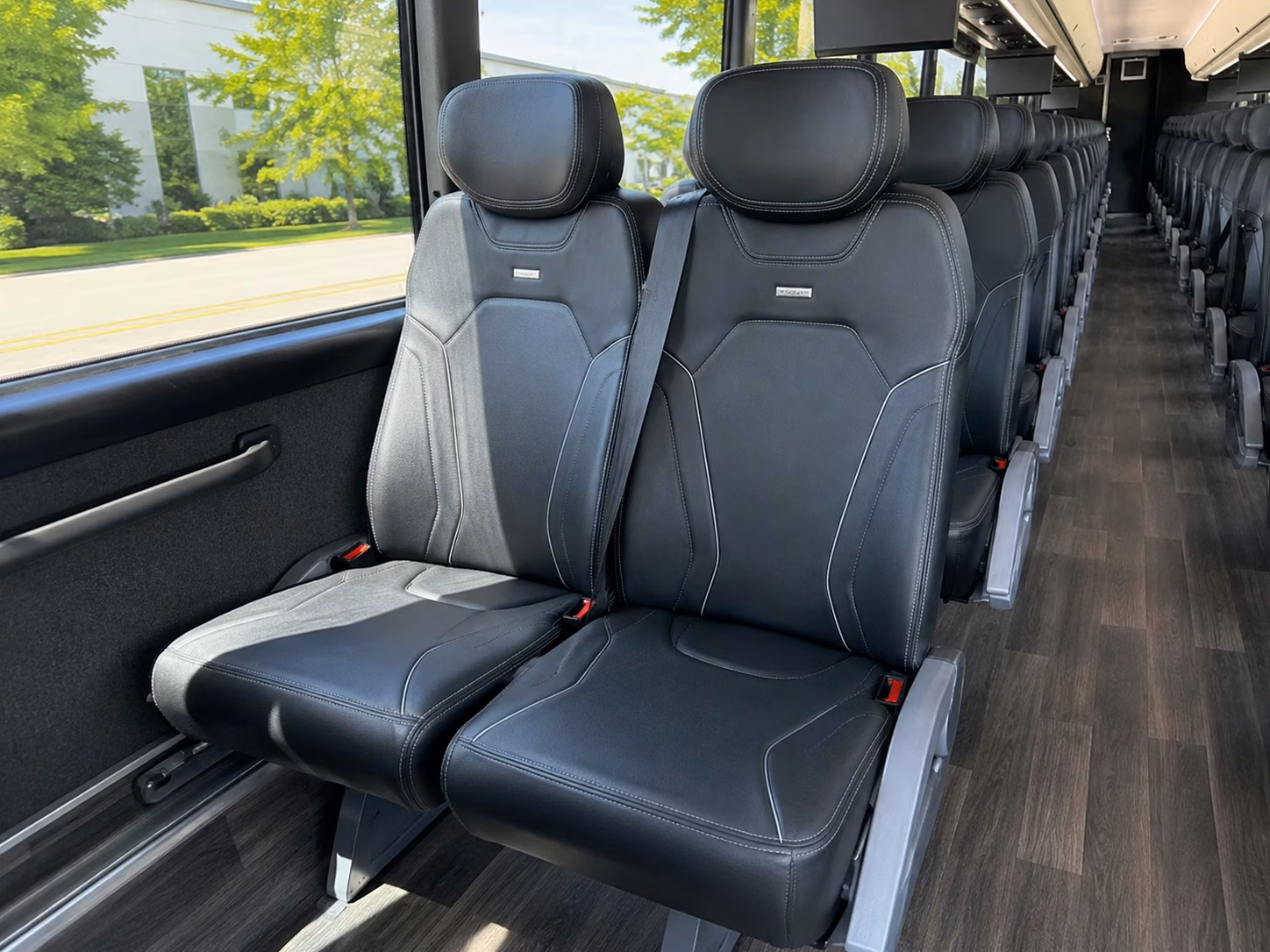 compare danbury government and military charter buses side by side
